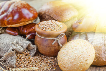 fresh bread and wheat on the wooden