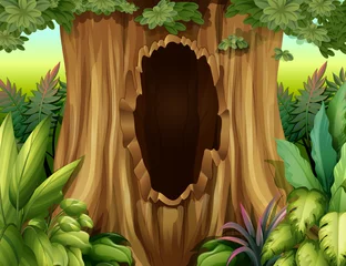 Poster de jardin Animaux de la forêt Un gros tronc d& 39 arbre avec un trou