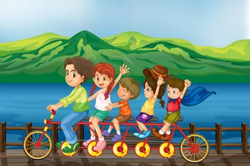 Tuinposter Kinderen fietsen bij de brug © GraphicsRF