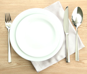 Table setting on wooden table