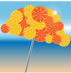 beach umbrella is decorated by oranges and grapefruits