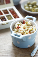 Couscous with sun dried tomatoes, olives and pepper