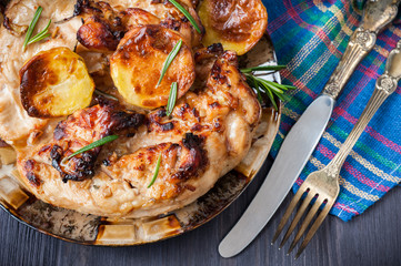 Grilled chicken fillet with potatoes and rosemary