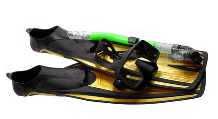 Mask, snorkel and flippers with water drops