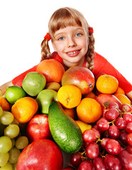 Child with group fruit and vegetable.