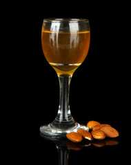 Tasty color liquor, isolated on black