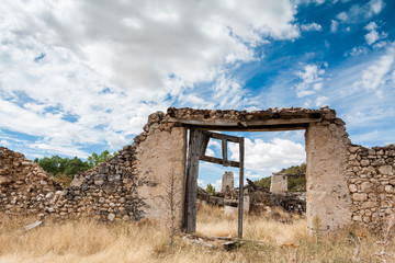 Ancient door in a stone wall