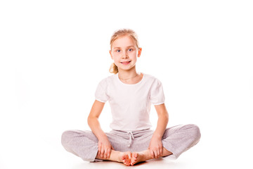 Beautiful girl gymnast  exercising, stretching