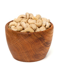 cashew nuts in a wooden bowl