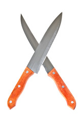 Crossed kitchen knives isolated on white
