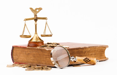 book of justice ,scale and magnifying glass