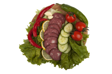 Sausage with vegetables on board