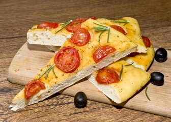 Focaccia with tomato  and black olives