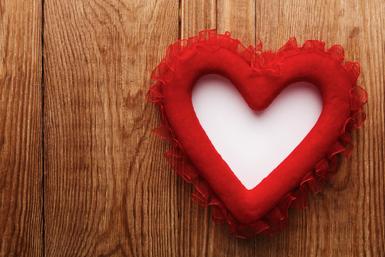 red heart on wood with copy space