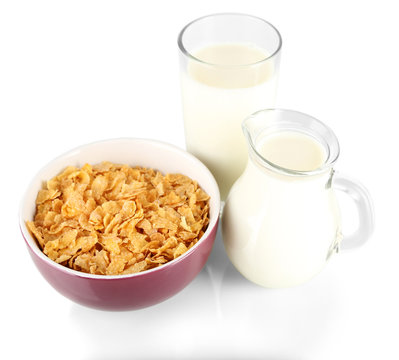 Delicious and healthy cereal in bowl with milk isolated on