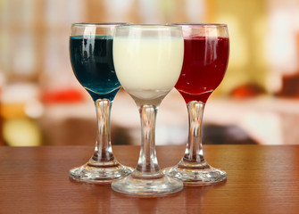 Tasty color liquors, on bright background