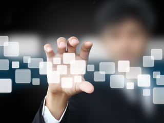 Businessman holding touchscreen