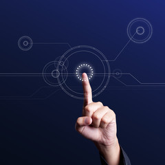 Hand pushing a media button