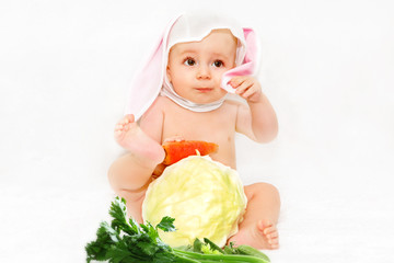 Child dressed as a rabbit with a carrot