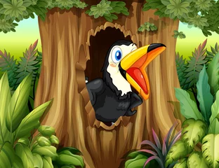 Poster de jardin Animaux de la forêt Un oiseau dans un arbre creux