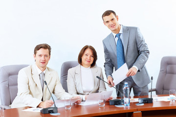 Three businesspeople at meeting