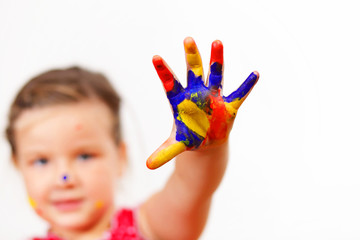 happy child with paint on the hands