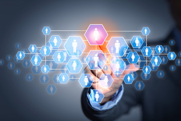 Image of male touching icon of social network