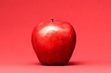 delicious apple on red