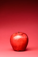 delicious apple on red