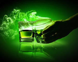 Two glasses of green absinthe