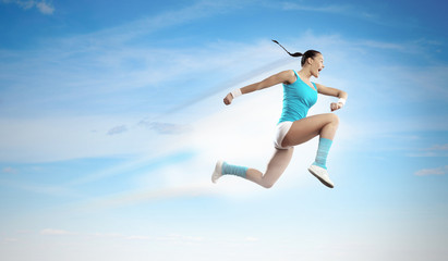 Image of sport woman jumping