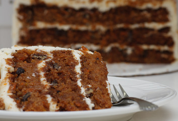 Slice of Carrot Cake on Plate with Fork