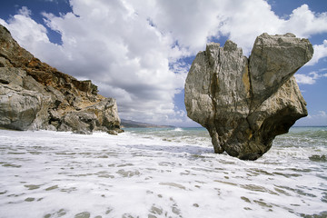 Huge rock in the sea.