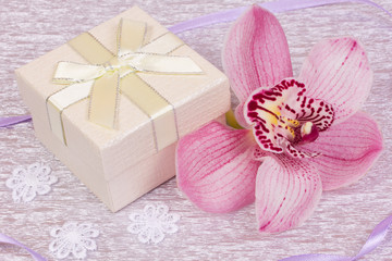 Fototapeta na wymiar Box for gift and orchid