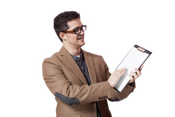 Young business man holding a clip board over white background