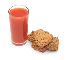 tomato juice glass with cookies isolated on white background