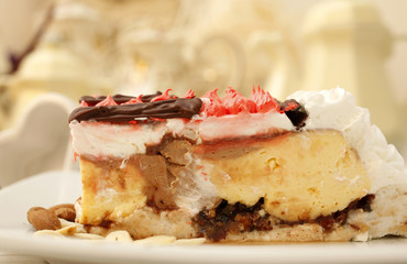 Piece of creamy fruit cake with chocolate