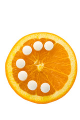 orange with vitamin c pills