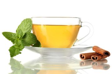 Cup of tea with mint and cinnamon isolated on white
