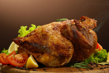Whole roasted chicken with vegetables,