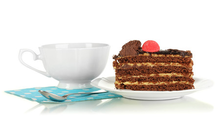 A cup of tea and delicious cake isolated on white