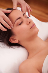 Massage treatment of the head