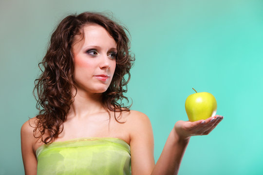 Beautiful spring woman with apple. Green concept