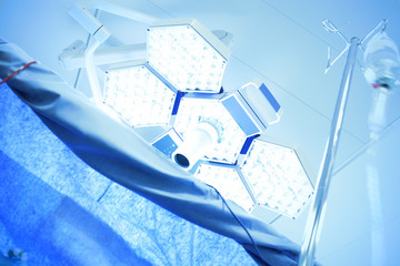 light of medical lamps in the operating room