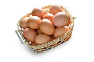 Eggs in basket, isolate on white
