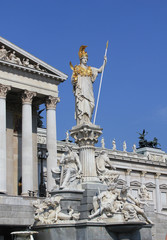 Obraz premium Statue of Athena in front of Austrian Parliament in Vienna.