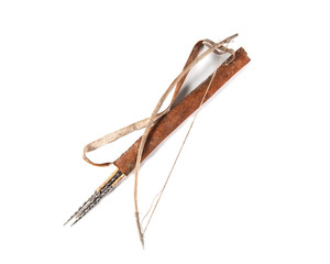 Old decorative bow, quiver and arrow on the white background