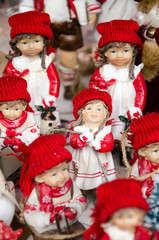 Multiple Christmas presents - dolls in white and red