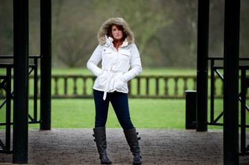 Pretty young red haired female outdoors