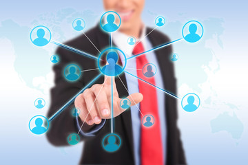 Businessman pressing modern social buttons